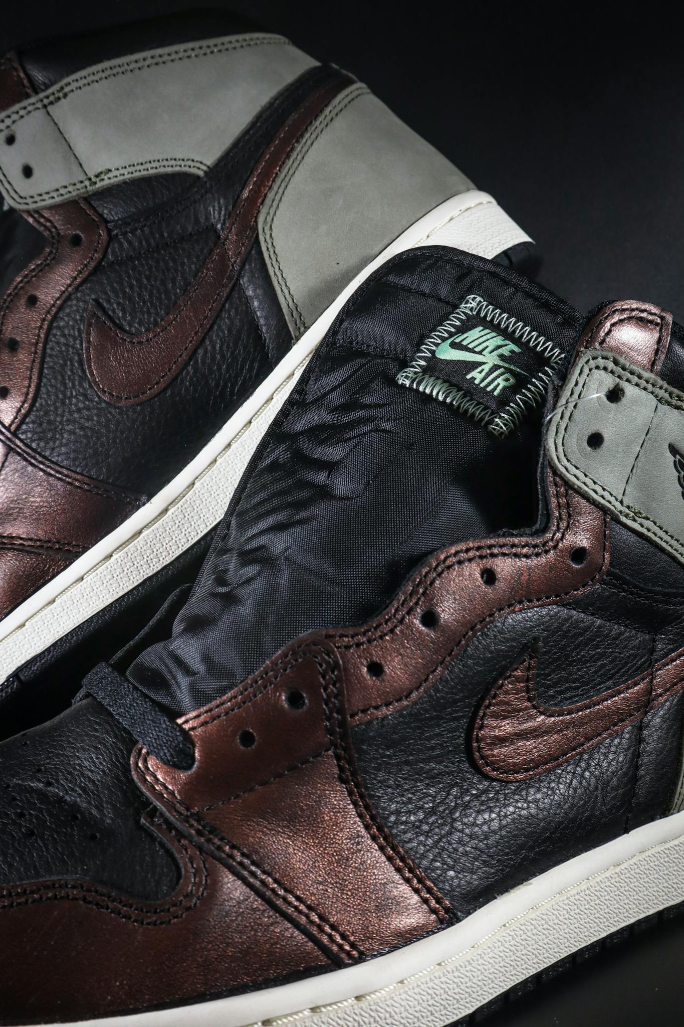 Detailed view of leather sneakers highlighting texture and design.
